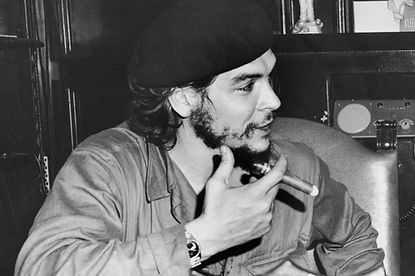 Ernesto Guevara smoking a Cuban cigar