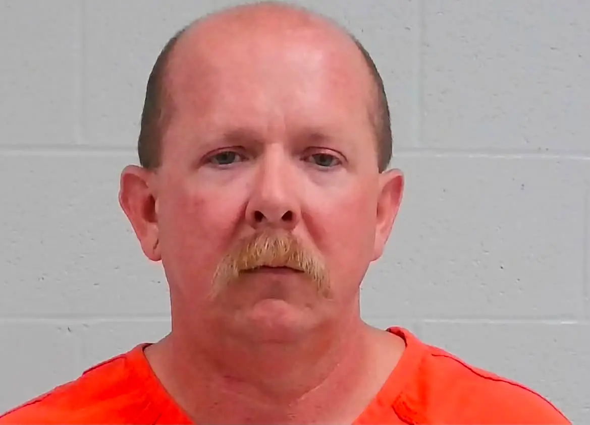 Scott County Fire Chief Arrested in Murder of Wife